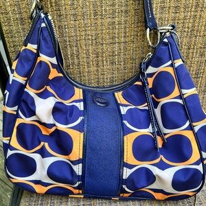 Navy and orange Coach hobo bag